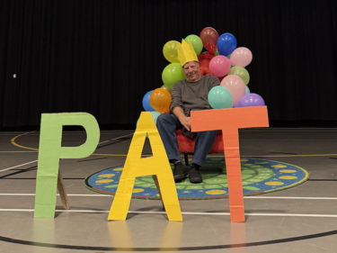 Pat crossing guard at ASIA North Poplar is celebrated