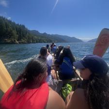 On the water for a Canoe trip with a group of students and community members